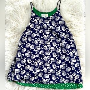 Anthropologie tank top. Size small. Blue swan print layered on Kelly green.
